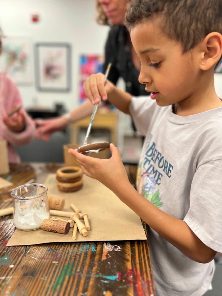 Young boy painting