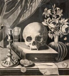 skull on book on table
