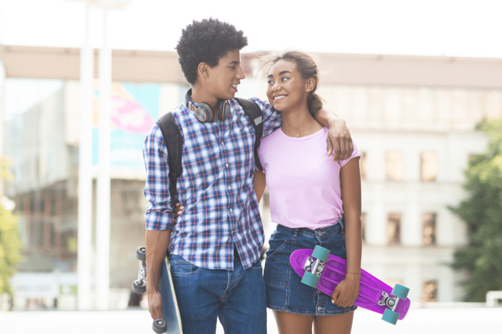 teen boy and girl looking at each other