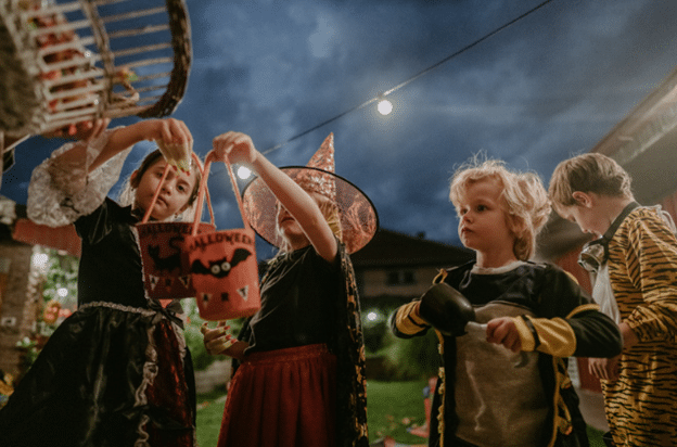 Group of children trick or treating