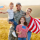 Veteran and family with US flags
