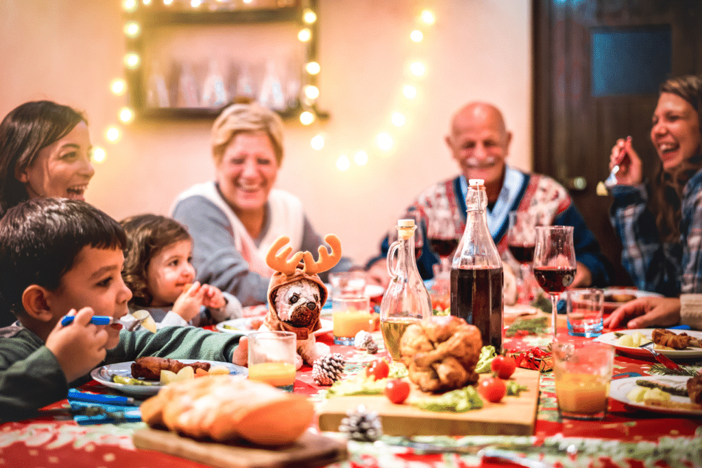 family laughing at celebratory dinner table