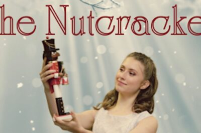 woman holding a nutcracker