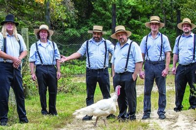 Group of Amish men with a turkey