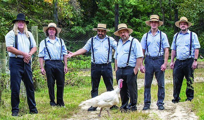 Group of Amish men with a turkey