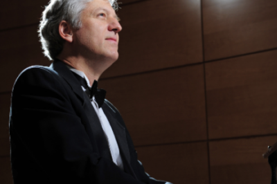 Man in tuxedo playing piano