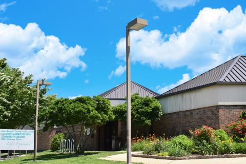 lamp pole in front of modern building