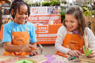 two girls creating crafts at Home depot