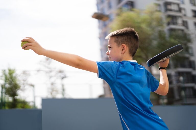 boy play padel on outdoor tennis court 2024 10 18 03 52 20 utc 1 768x512