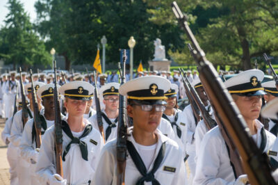 US Naval Academy plebes marching in a parade