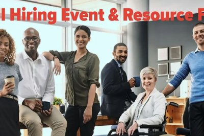variety of people posing in an office
