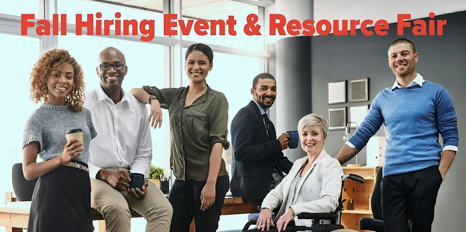 Variety of people posing in an office